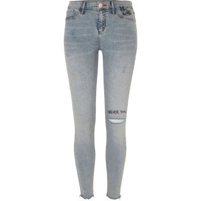 Light wash slogan ripped Molly jeggings
